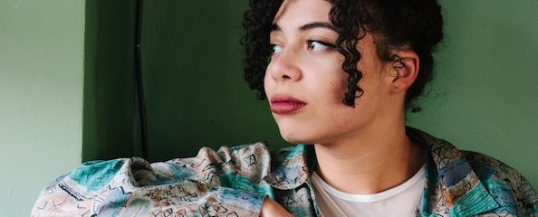 girl looks out window