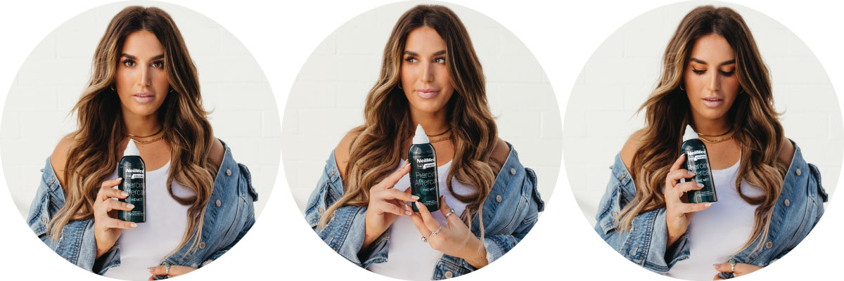 NeilMed Piercing Aftercare Woman Holding PAC Can