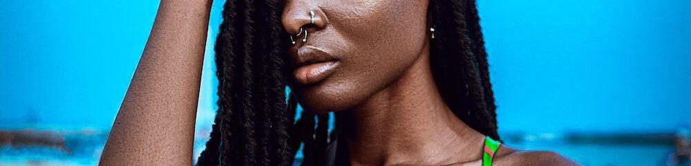 woman with multiple nose piercings