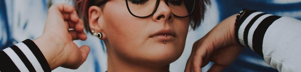 Woman with a vertical labret piercing