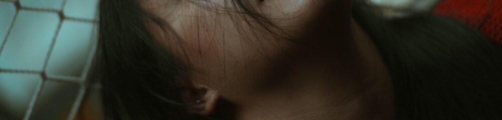 Woman with septum and ashley piercings