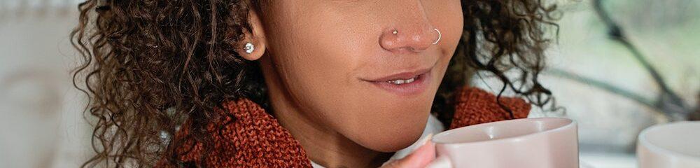 Woman with two nostril piercings