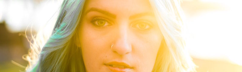 Girl with Nose Piercing in the Sun