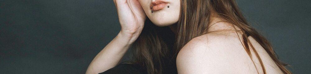 Woman with two side labret piercings