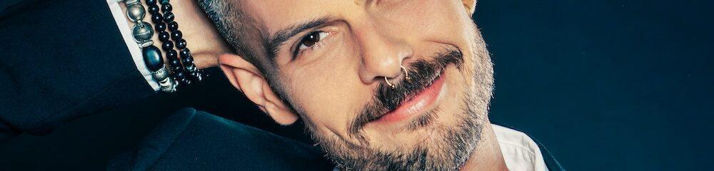 Man with Septum Piercing and Tattoos