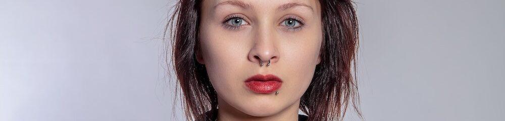 Woman with Septum and Side Labret Piercings