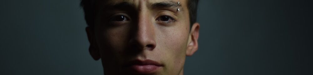 Man with Eyebrow Piercing