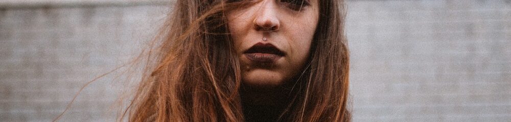 Woman with Medusa Piercing