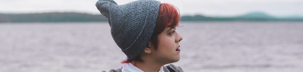 Woman with septum piercing looking into the distance