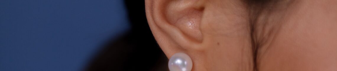 Woman with lobe piercing