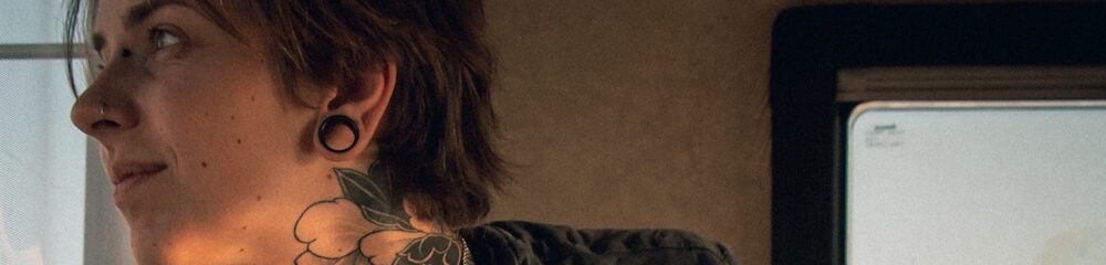 Person on a bus looking out the window