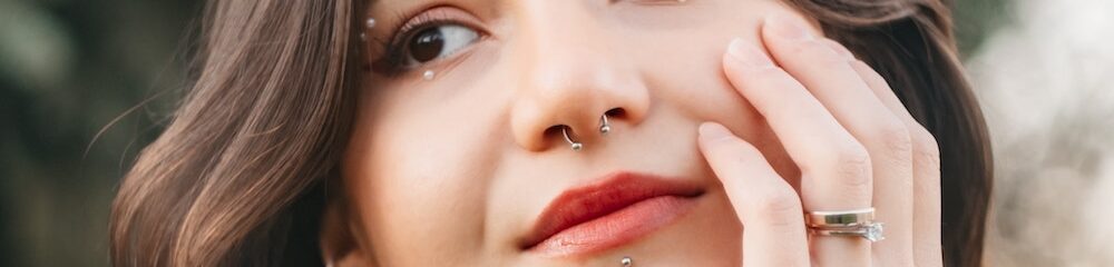 woman with a labret and septum piercings