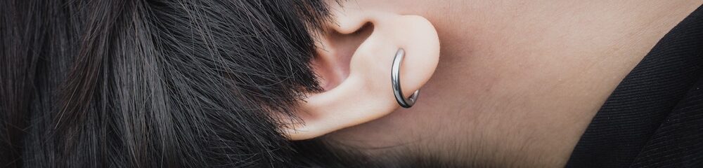 Close up of titanium or steel earring