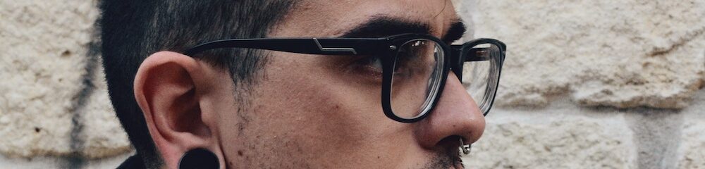 Man with Acryllic Ear Plug