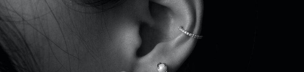 inner conch piercing with hoop